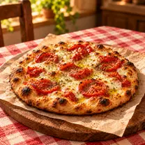 Venecia, focaccine de Pizza Azzis en Providencia con queso mozzarella, tomate y orégano