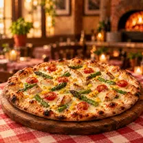 Pizza N°31 de masa delgada a la piedra con pollo, espárragos, tomate cóctel, choclo, Pizza Azzis Providencia